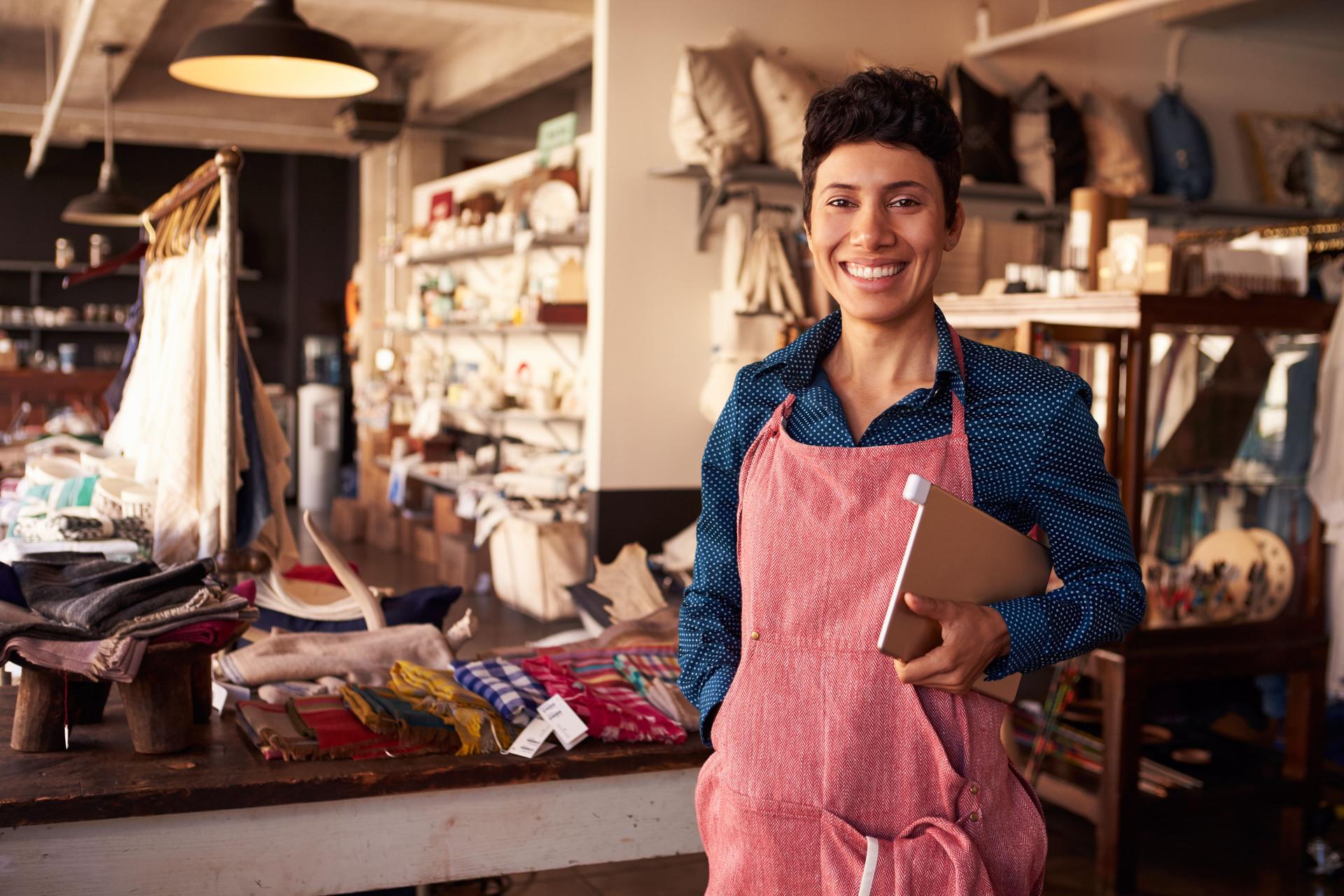 Portrait Of Female Owner Of Gift Store With Digital Tablet
